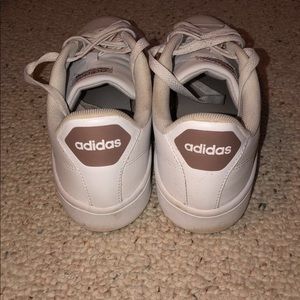 White and rose gold adidas sneakers